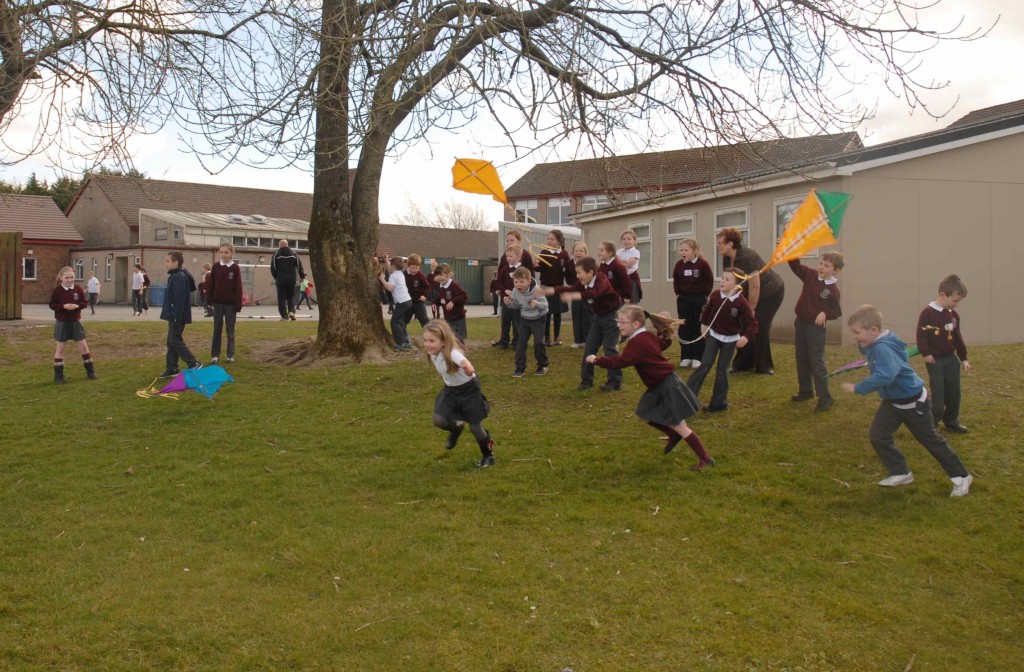 Children took it in turns to try and fly the kites.