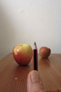 We can eye up the size against a pencil held VERTICALLY with an outstretched arm.