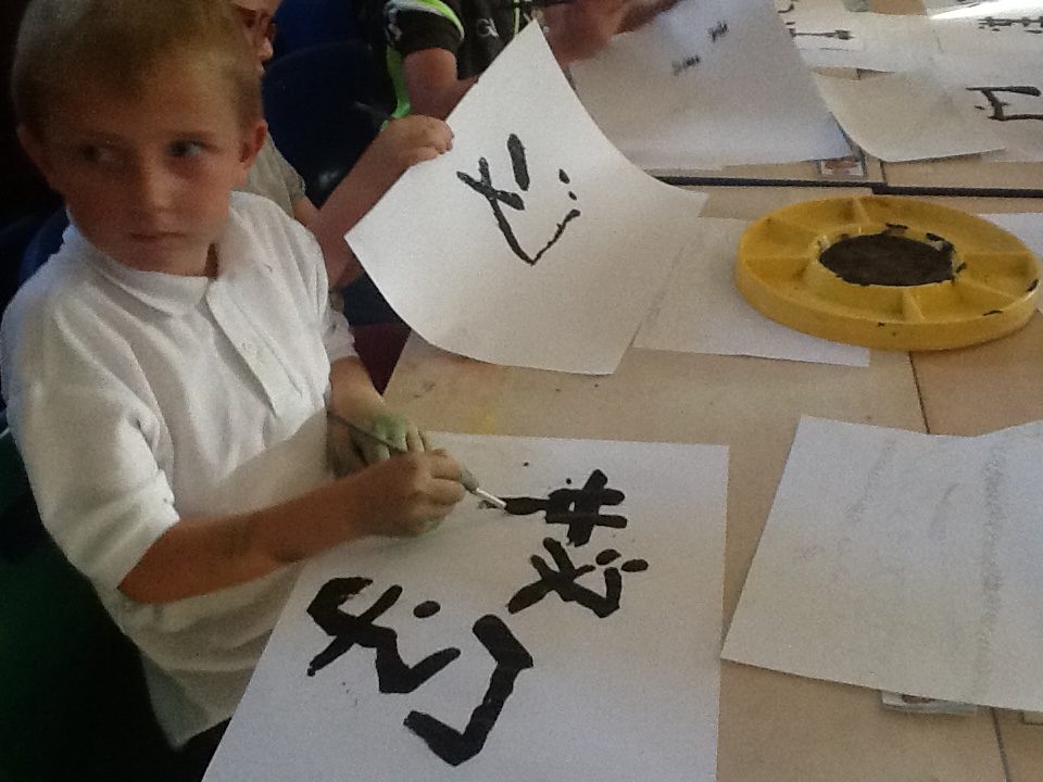 Look at the wonderful shapes the children created using a plain school paintbrush!